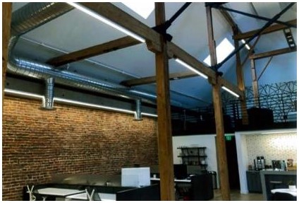 After: view of gable roof mezzanine from the second floor